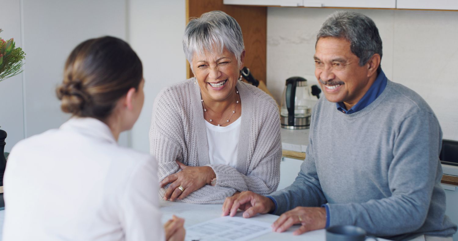 A financial professional helping an older couple plan together